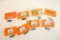 Six Glock channel liners and one AK grip T-nut, new in pkgs