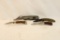 Bag containing four folding pocket knives, one Magnum 2
