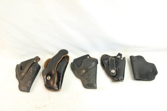 Five small leather holsters