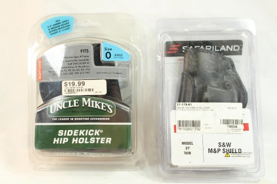 Two new in pkg holsters, one for S&W M&P Shield and one fits 2-3" barrel revolvers