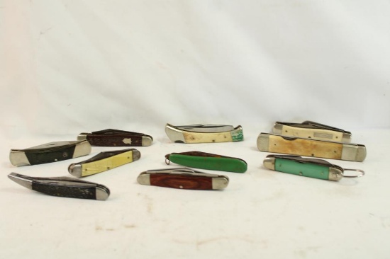 Ten folding pocket knives