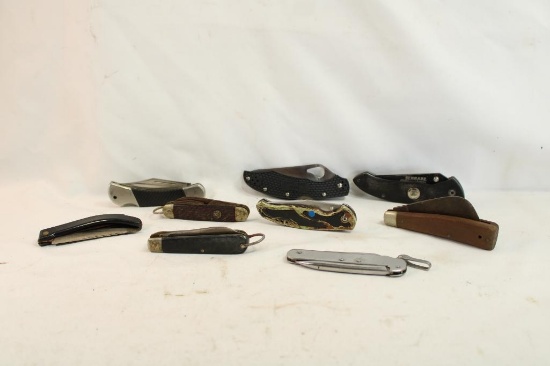Ten folding pocket knives