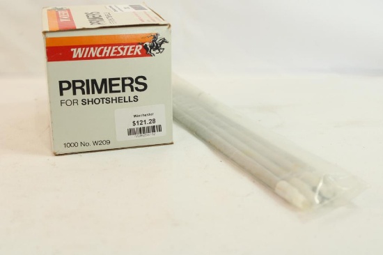 One box of Winchester W209 shotgun primers, count 1000, and 4 primer loading tubes.