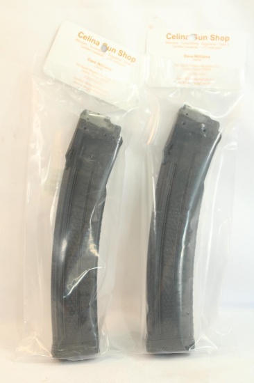 Two Sig Sauer extended pistol cartridge, looks to be for 45 ACP.