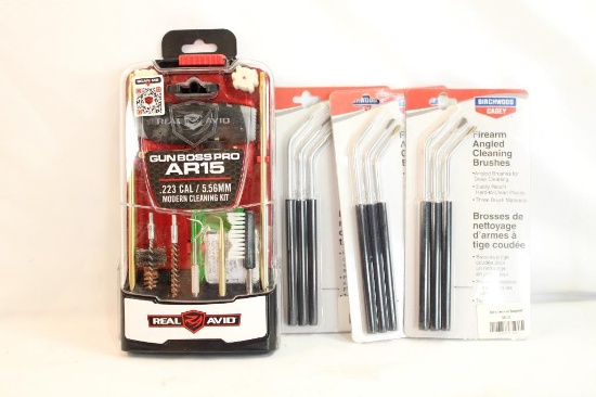 One Gun Boss AR-15 cleaning kits and three Birchwood angled cleaning brushes. In packages.