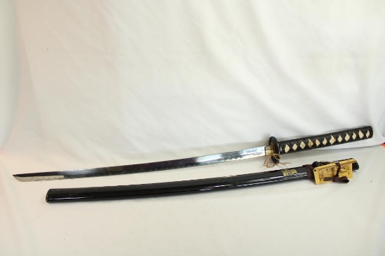 One Hattori Hanzo Samurai sword. The Bride's sword.