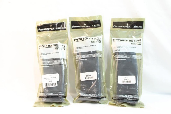 Three MagPul 30 round AR/M4 magazines. In packages.