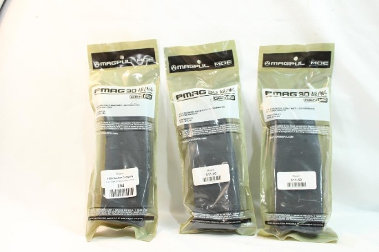 Three MagPul 30 round AR/M4 magazines. In packages.
