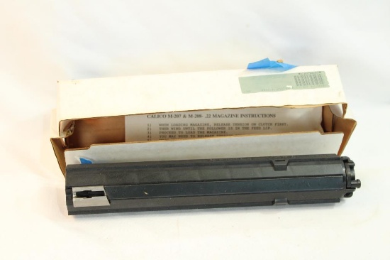 One Calico M100 22LR magazine. In box.
