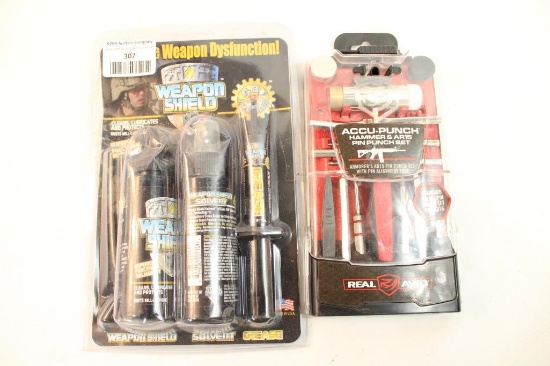 One Real Avid Accu-punch set for AR-15, and one Weapon Shield oil, lube kit. In packages.