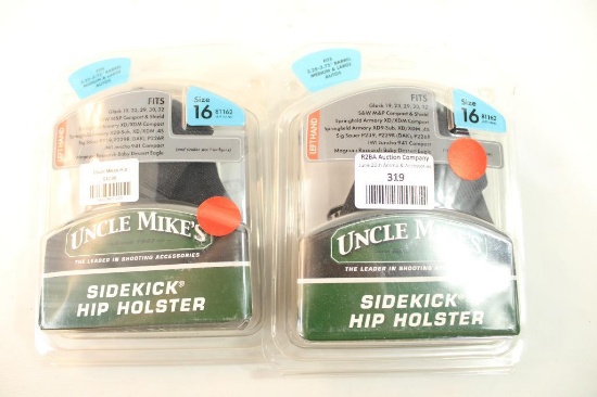 Two Uncle Mike's Size 16 left handed holsters, fits 3.25-3.75" barrels medium & large autos. In