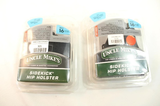 Two Uncle Mike's Size 16 left handed holsters, fits 3.25-3.75" barrels medium & large autos. In