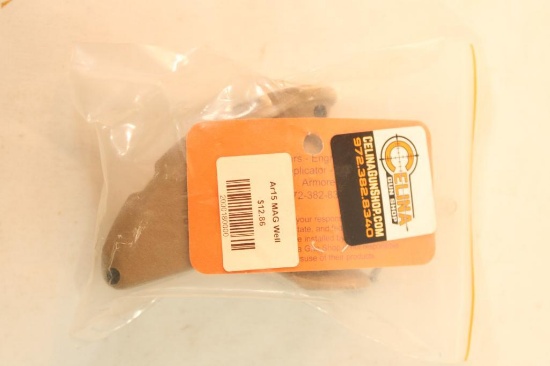 One AR-15 magazine well. In package.