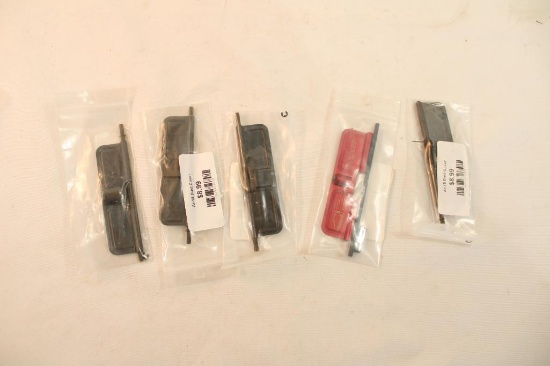 Five AR-15 dust covers. In packages.