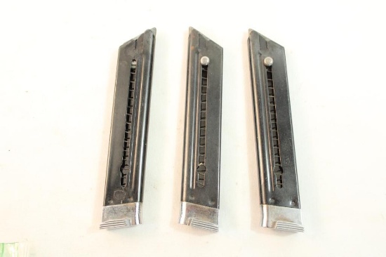 Three Ruger Mark II magazines.