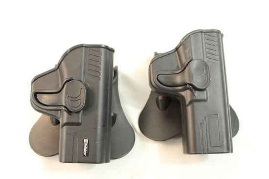 Two right handed paddle holsters.