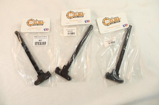 Three AR charging handles. In packages.