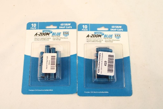 Two packages of 40 S&W snap caps.