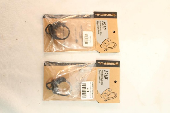 Two MagPul ASAP ambidextrous sling attachments. In packages.