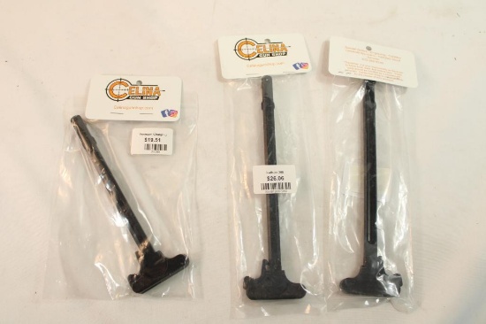 Three AR charging handles. One for AR-15 and two for 308. In packages.