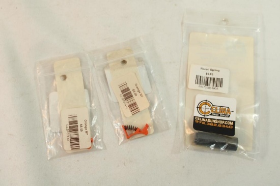 One 1911 recoil spring plug and two Glock trigger springs. In packages.