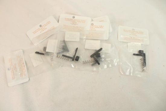 Six AR magazine releases. In packages.