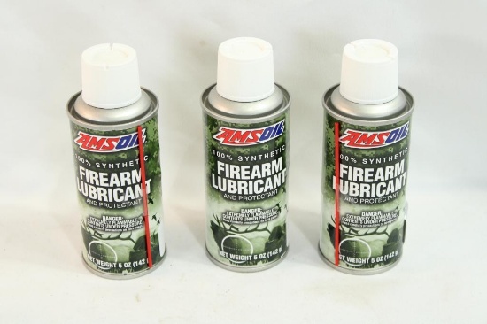 Four cans of AMSoil firearms cleaner.