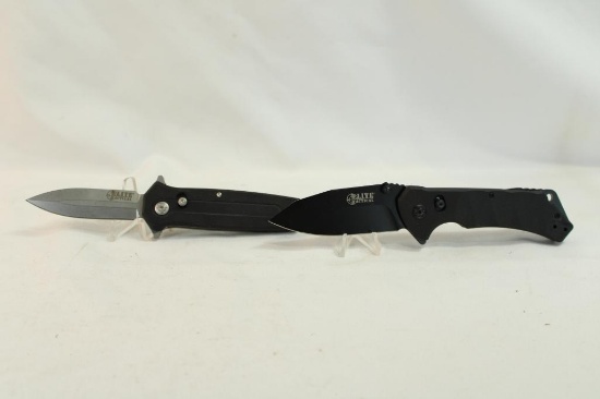 Two Elite Tactical belt clip assisted opening knives. In boxes.