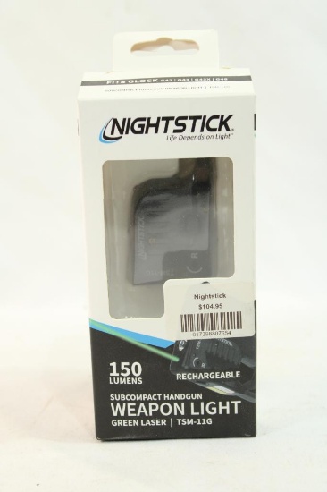 One NightStick weapon light. In box.
