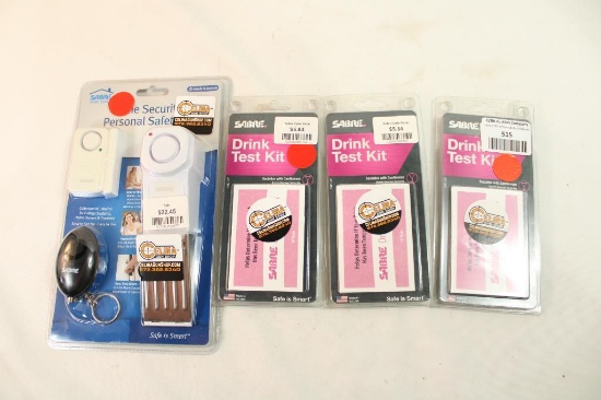 One Sabre door alarm and three Sabre drink test kits. In packages.