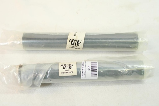 Two AR-15 fake suppressor.