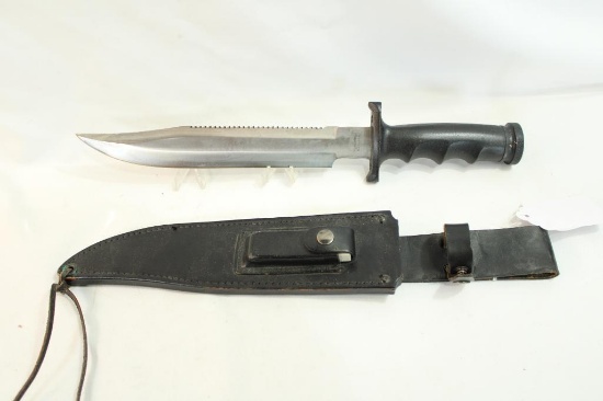 One 10" fixed blade survival knife with leather sheath.