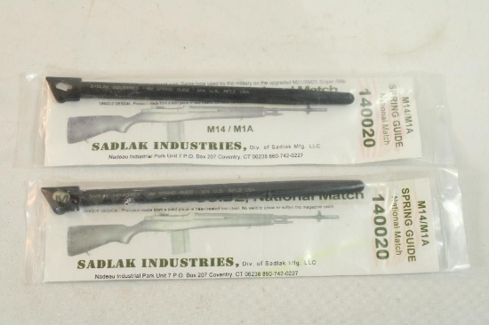 Two M14/M1A spring guides. In packages.