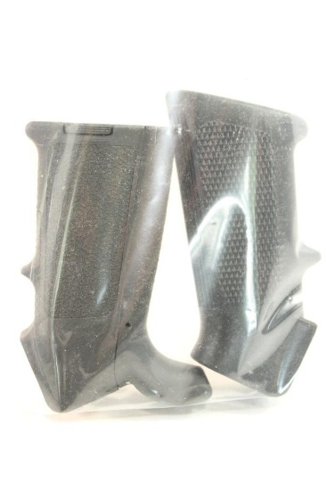 Two AR-15/M-16 pistol grips one Magpul and one unknown