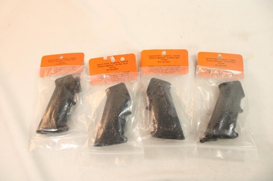 Four AR15 pistol grips, new in pkg