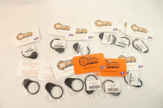 Twelve AR 15 end plates, new in pkgs