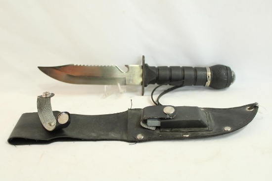 Survival knife with sheath, compass and sharpening stone