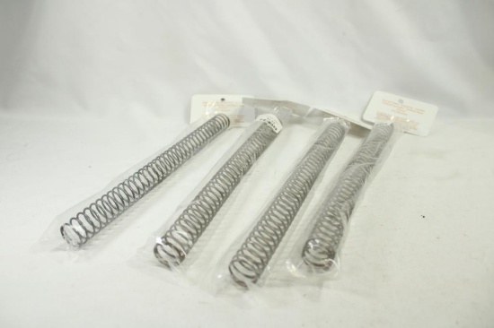 Four carbine buffer springs, new in pkgs