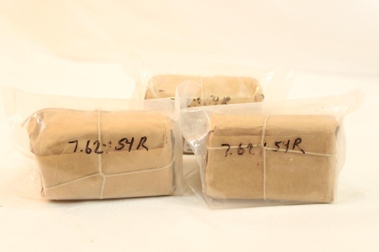 Three paper wrapped 7.62x54R. Count 30.