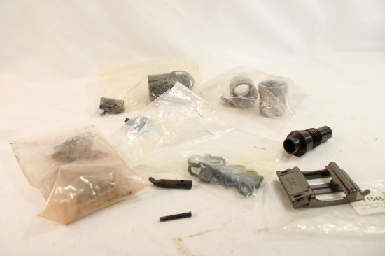 Bag with one threaded .45 barrel bushing adaptor, 4 quick release swivels, gun belt buckle, trigger