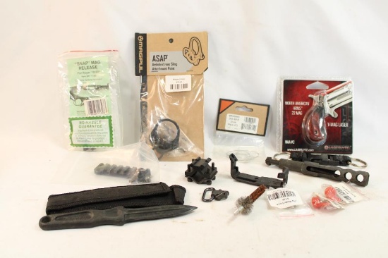 Bag containing an M14 combination tool, North American Arms 22 Mag v-mag laser new in p kg, .308 bar