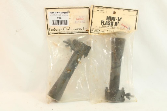 Two Federal Ordnance Mini- 14 flash hiders with quick clamps, new in pkgs