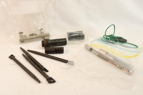 Four M14 spring guides, muzzle break, scope rings and rail, two firing pins with springs