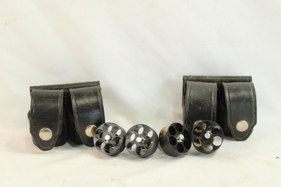 Two Six Second Reload leather speedloader holsters with 4 speedloaders