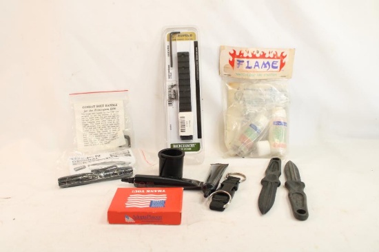 Bag containing Leupold 1 pc base for Whby short action, matchless flame starters, combat bolt handle