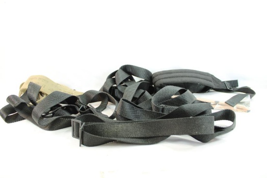 Six nylon gun slings and one military helmet sweatband