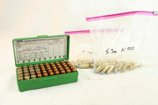 Plastic ammo box and two baggies of .45 Auto reloads, 78 count total