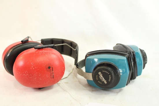 Two sets of ear protection, one Silencio and one Peltor