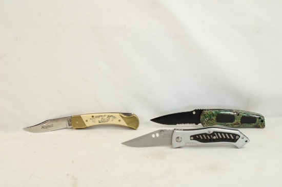 Bag containing three folding pocket knives, One Schrade Scrimshaw with Leopard And 4" blade and two