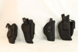 Four RH black nylon holsters